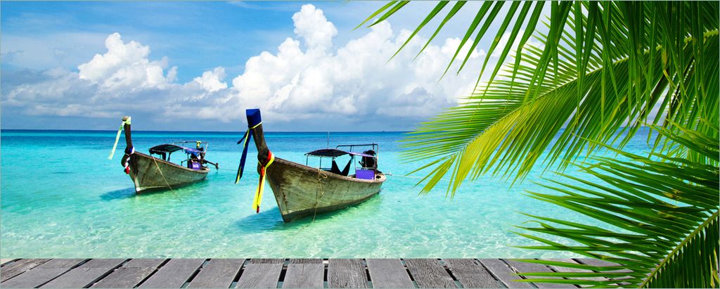 Wallario Poster - Sonnenboot in der Karibik, Kunstdruck Größe: 50 x 125 cm