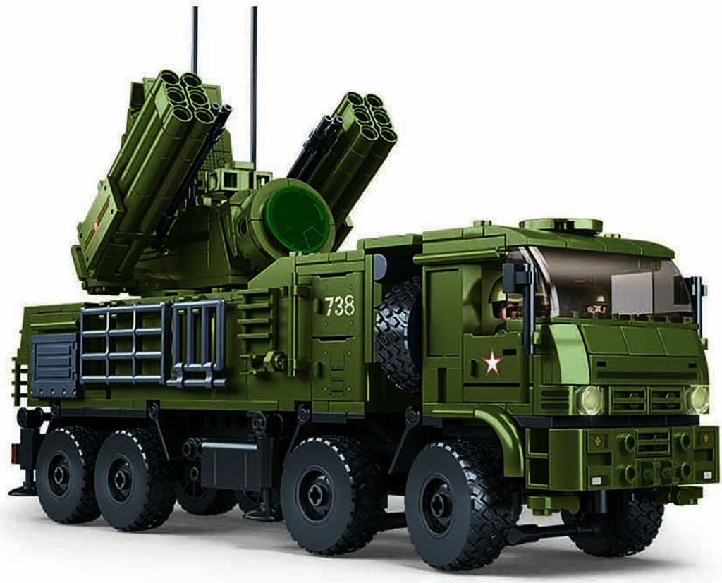 A green military vehicle model with missile launchers.