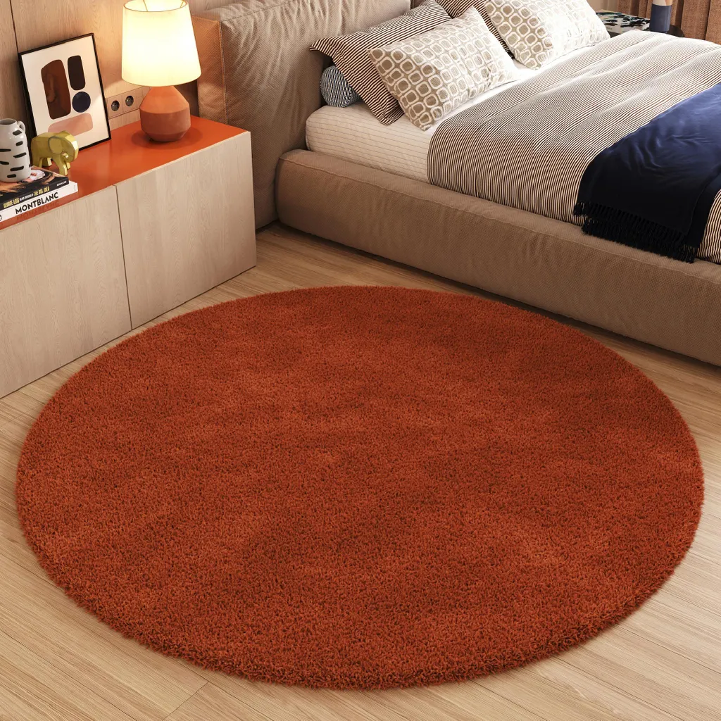 Tapis Rond Orange 120 cm ESSENCE - Finissez-en avec les Sols Gris et Froids