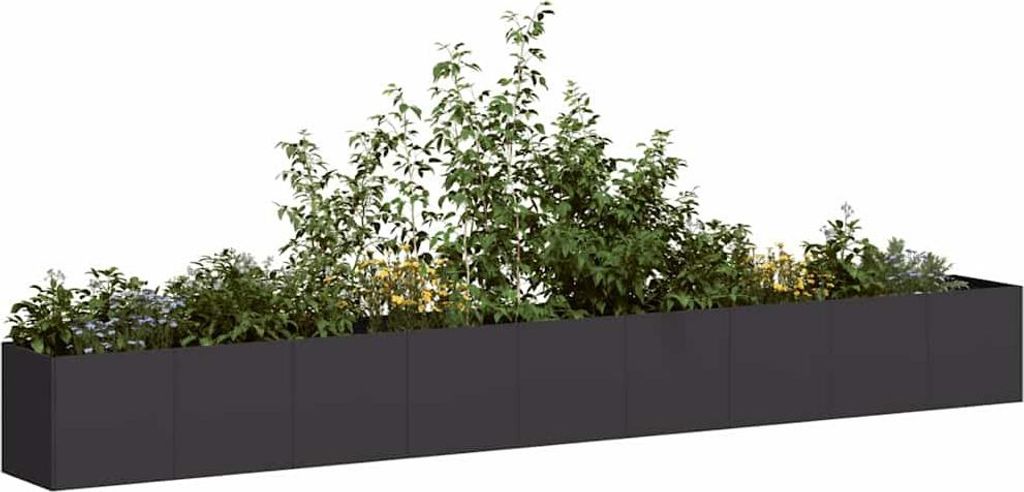 A long, rectangular black planter filled with various green plants and foliage, set against a plain white background.