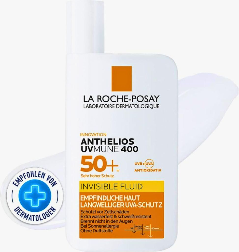 A bottle of La Roche-Posay sunscreen with a promotional badge.