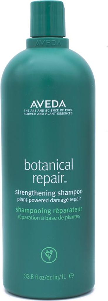 A teal bottle of Aveda Botanical Repair Strengthening Shampoo against a white background.