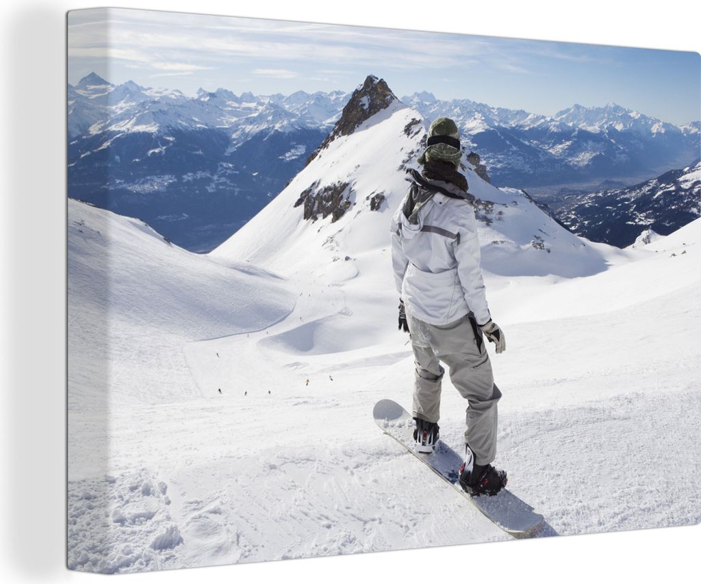 OneMillionCanvasses - Leinwandbilder - 140x90 cm, Ein Snowboarder blickt auf die schneebedeckten Berge, Wandbilder Kunstdruck Wanddekoration - Fo...