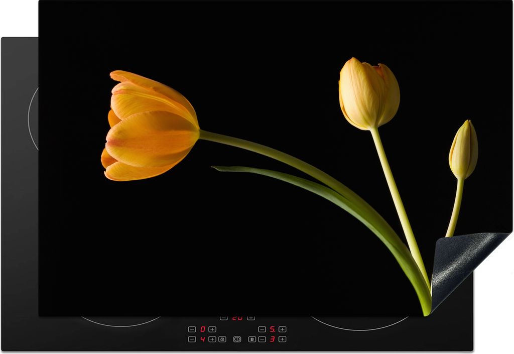 KitchenYeah Herdabdeckplatte Gelbe Tulpen auf schwarzem Hintergrund , 77x51cm, Küche Deko, Glaskeramikkochfeld Herdabdeckung, Abdeckplatte fùr ...
