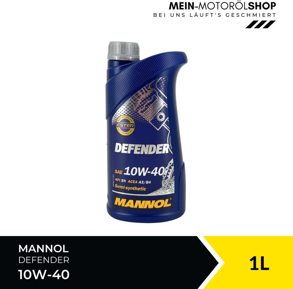 A bottle of Mannol Defender 10W-40 engine oil is shown against a white background. The bottom of the image has a black and yellow graphic element with the text '1L'.