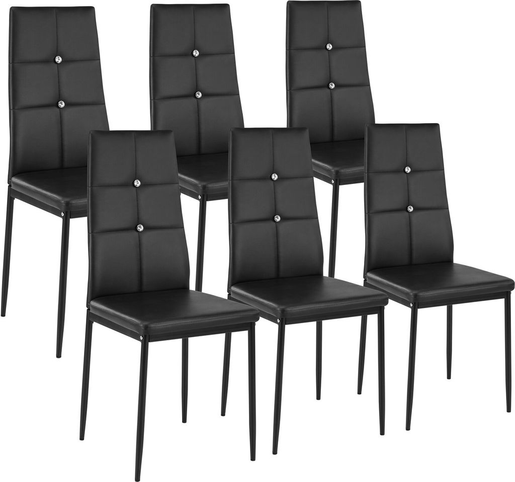 A set of six black dining chairs arranged in a studio setting against a white background.