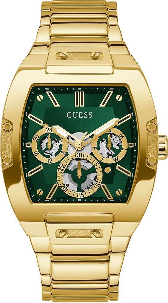 A close-up studio shot of a gold and green Guess watch.