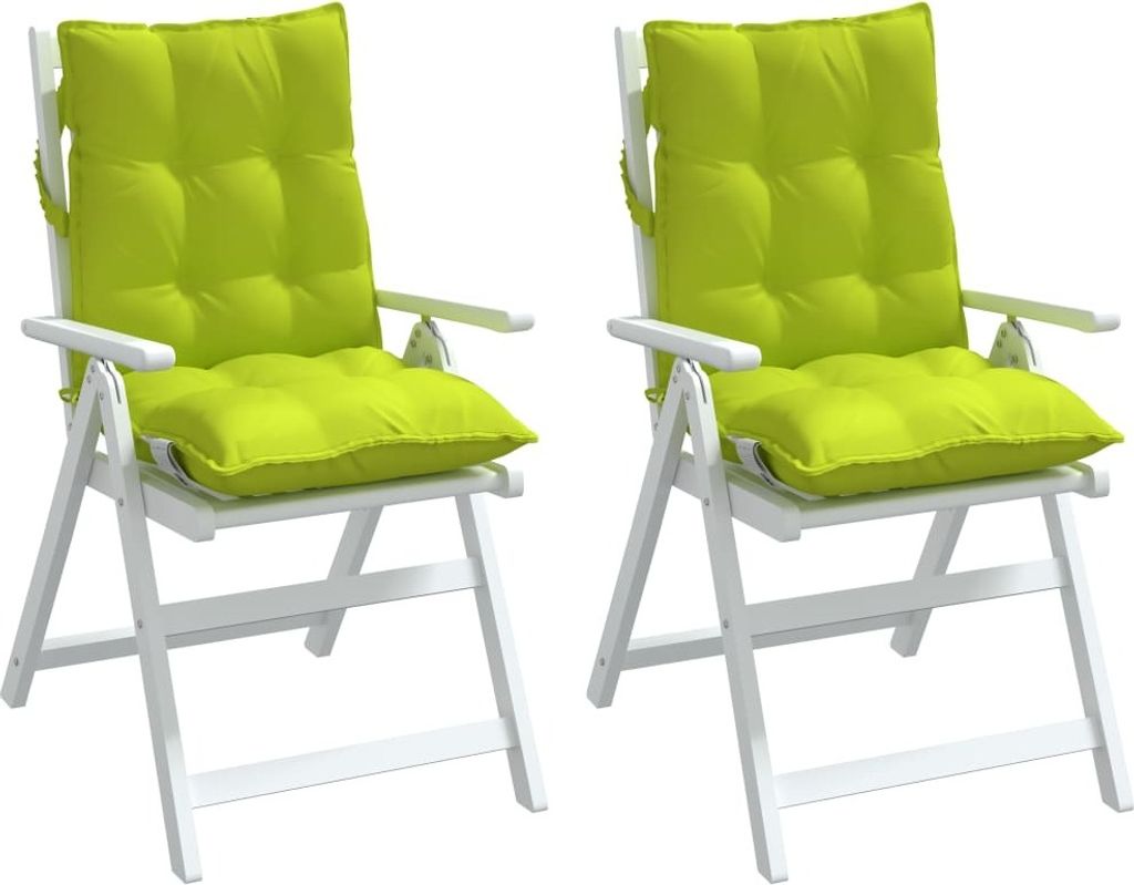 Two green chair cushions on white folding chairs.