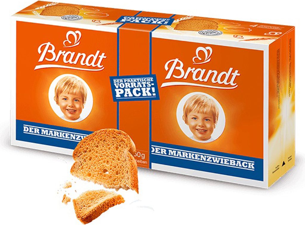 A product box of Brandt Zwieback with a slice of Zwieback in the foreground.