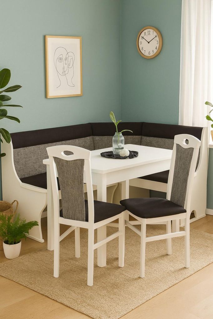 A dining set with a corner bench and chairs in a room.