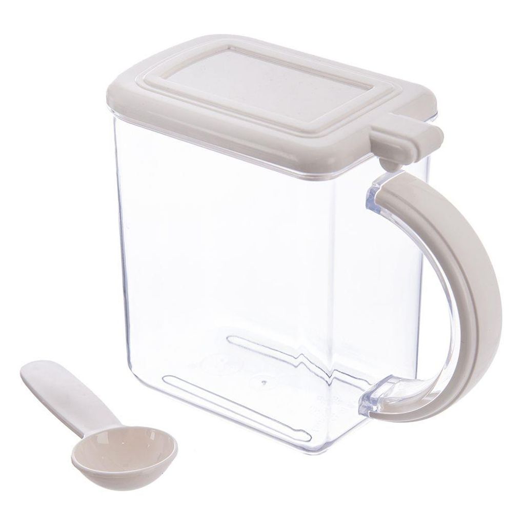 A clear studio shot of a transparent plastic storage container with a white lid and handle, along with a small white scoop.