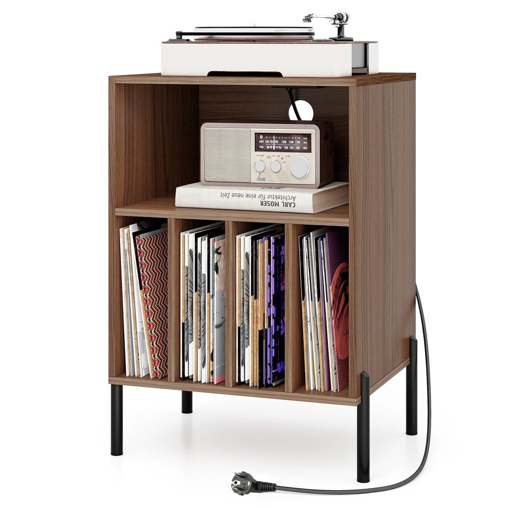 A turntable stand with a record player, radio, and books.