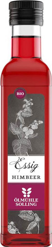 A bottle of raspberry vinegar with a label featuring botanical illustrations and text.