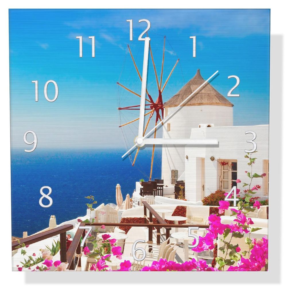Wallario Design Wanduhr Windmühle über azurblauem Meer aus Aluverbund, Größe 30 x 30 cm