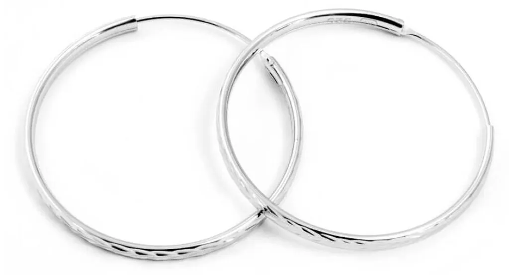 Boucles d'oreilles argent scintillantes confortables pour oreilles