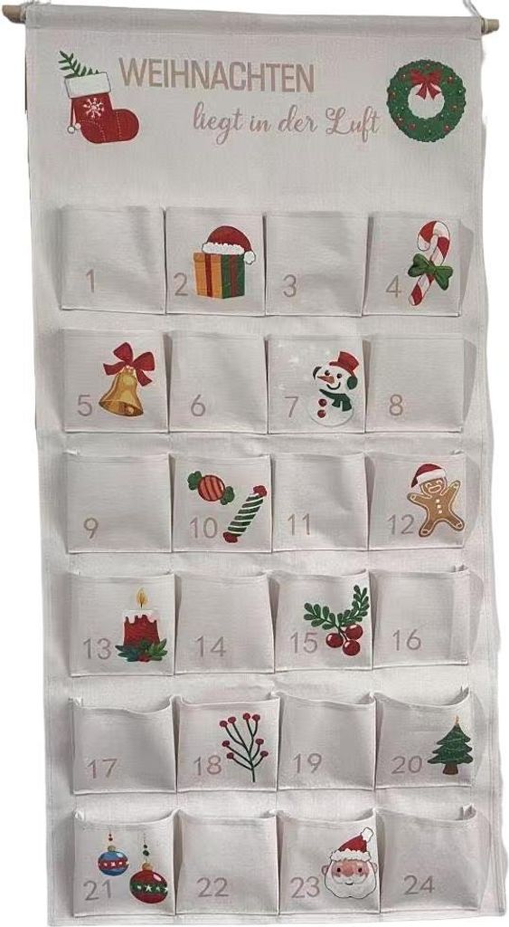 A hanging fabric advent calendar with 24 numbered pockets, each decorated with a Christmas-themed applique.