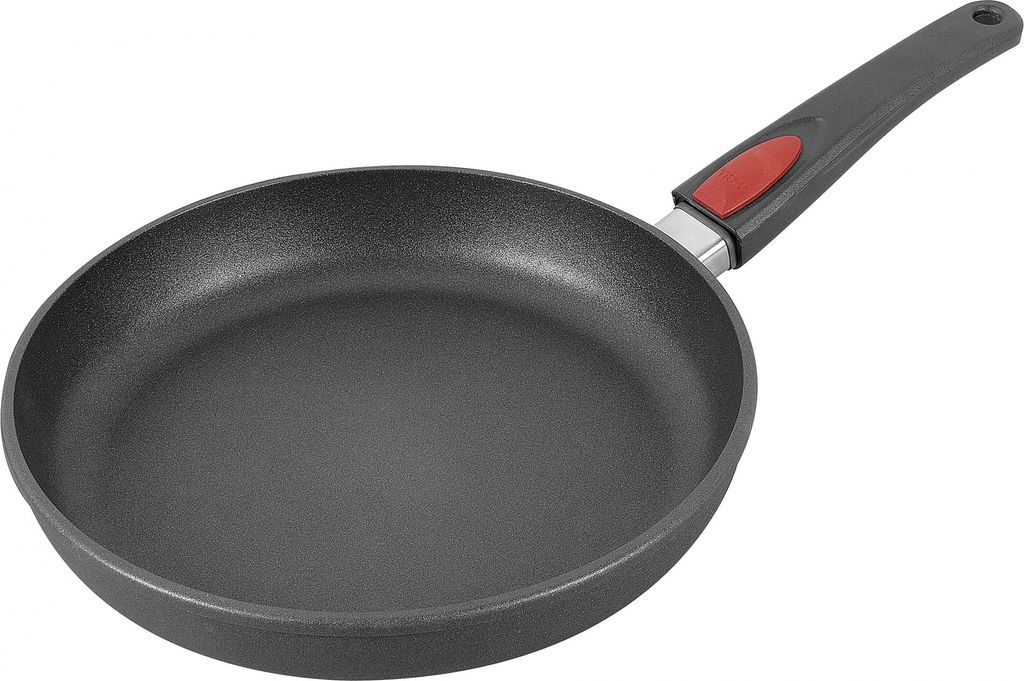 A black frying pan with a gray and red handle is shown against a white background.