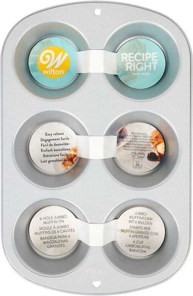 A top-down view of a silver muffin tin with product information labels attached.