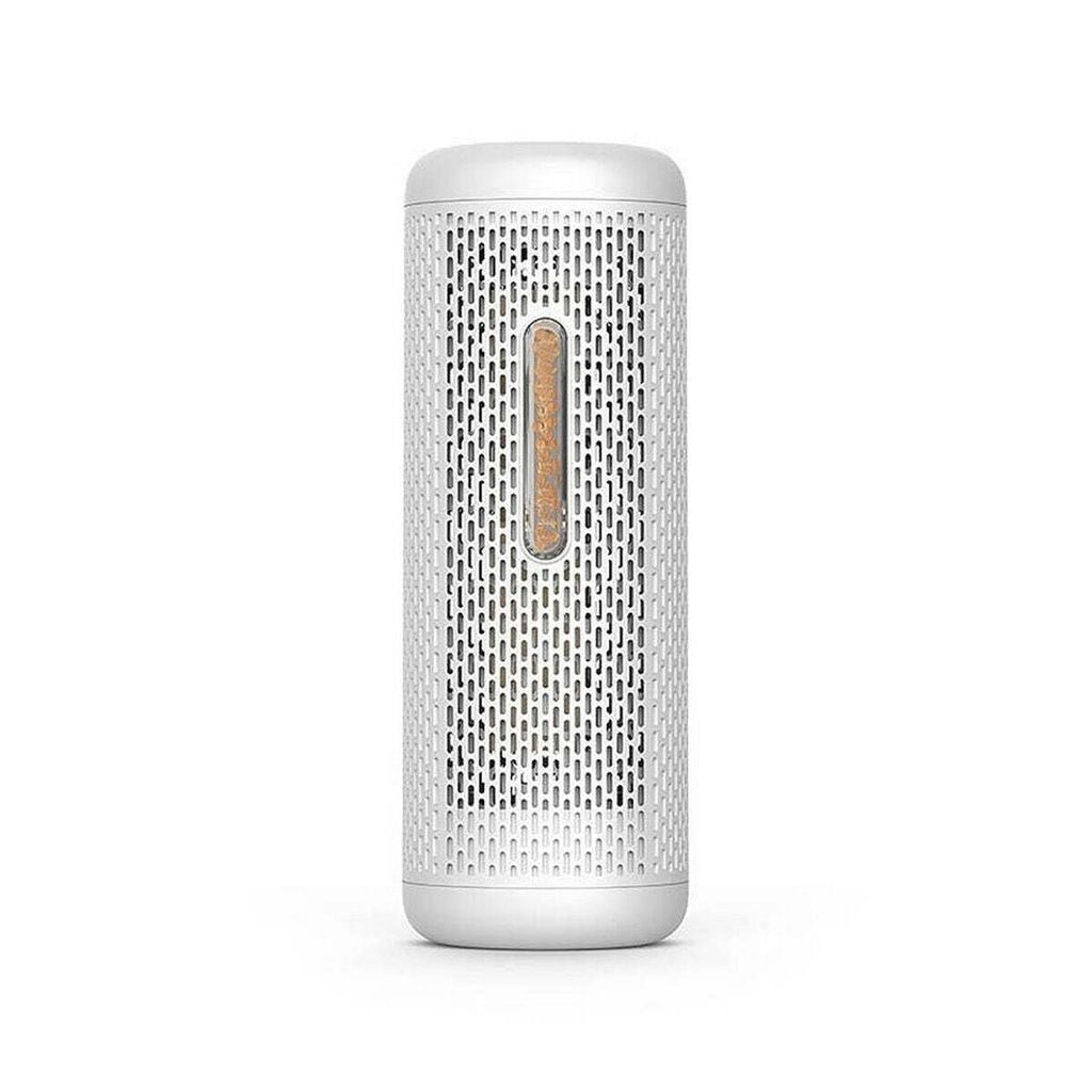 A small white dehumidifier with a brown indicator strip.