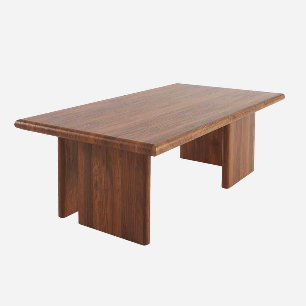 A wooden coffee table on a plain background.