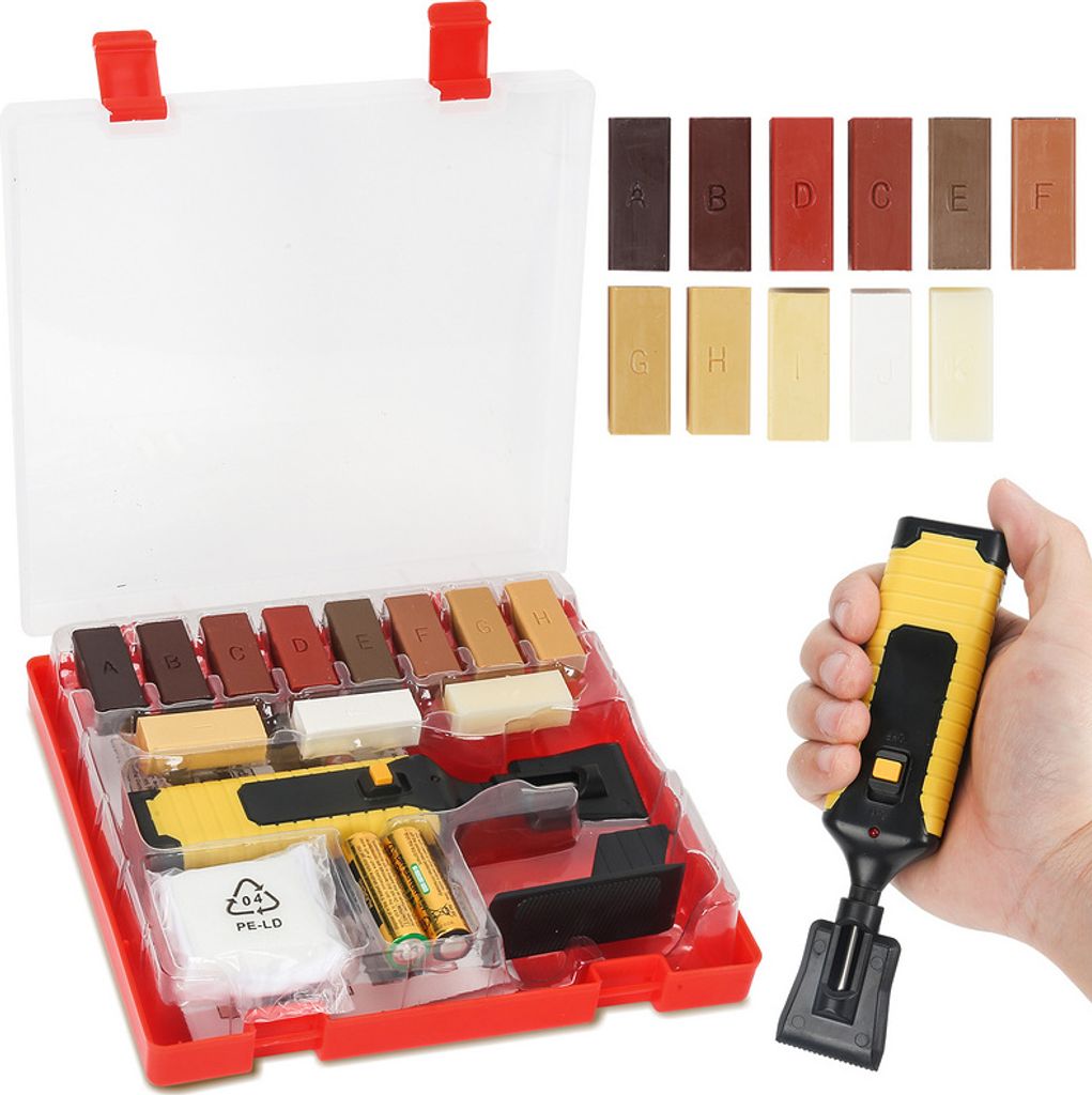 A hand holds a yellow and black repair tool over a red case containing various colored repair sticks and batteries.