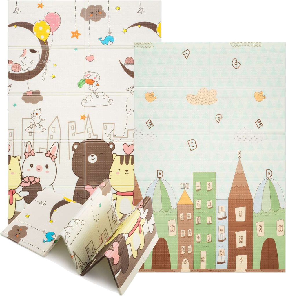 A folded baby play mat with cartoon animal and city designs.