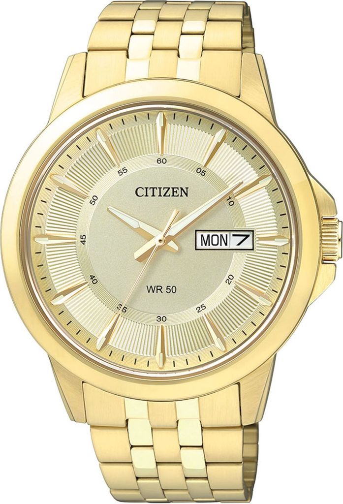 A close-up studio shot of a gold Citizen watch.
