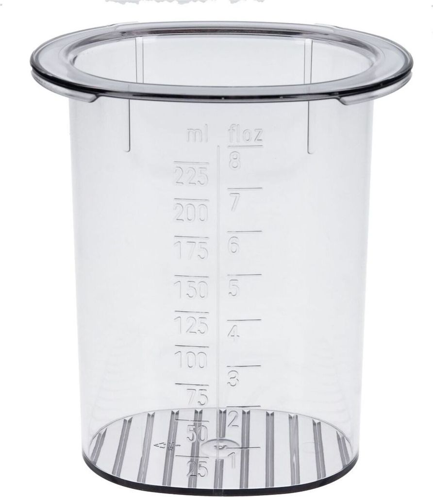A clear, studio shot of a transparent measuring cup with markings for milliliters and fluid ounces.