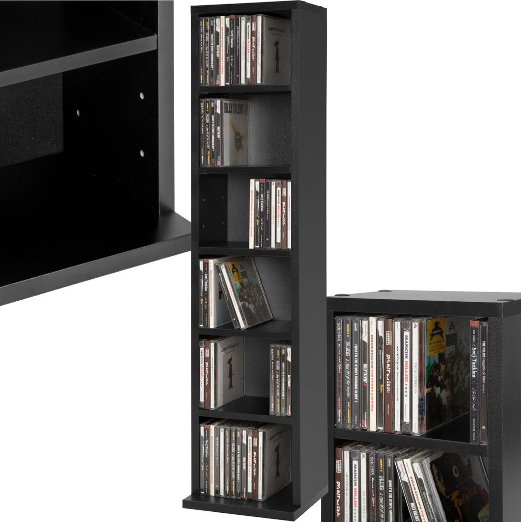 A black CD/DVD storage shelf unit filled with CDs and DVDs, shown from a slightly angled perspective.