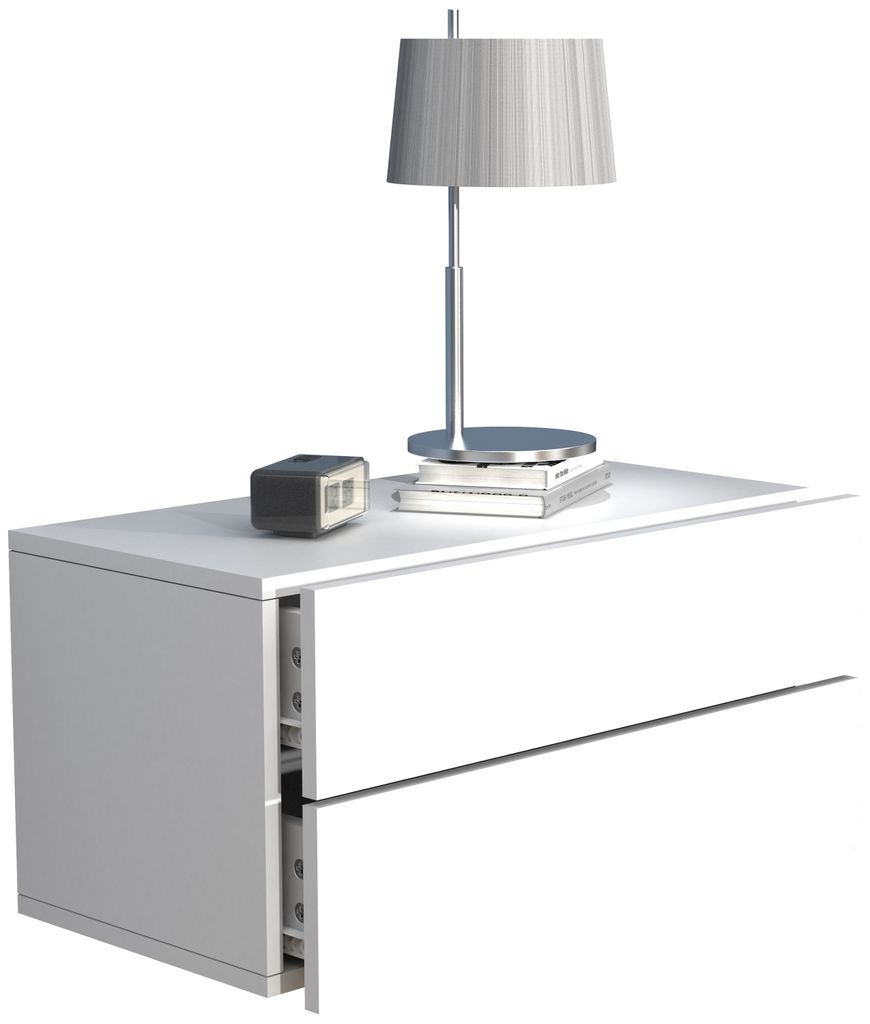 A white bedside table with a lamp and a small digital clock on top.