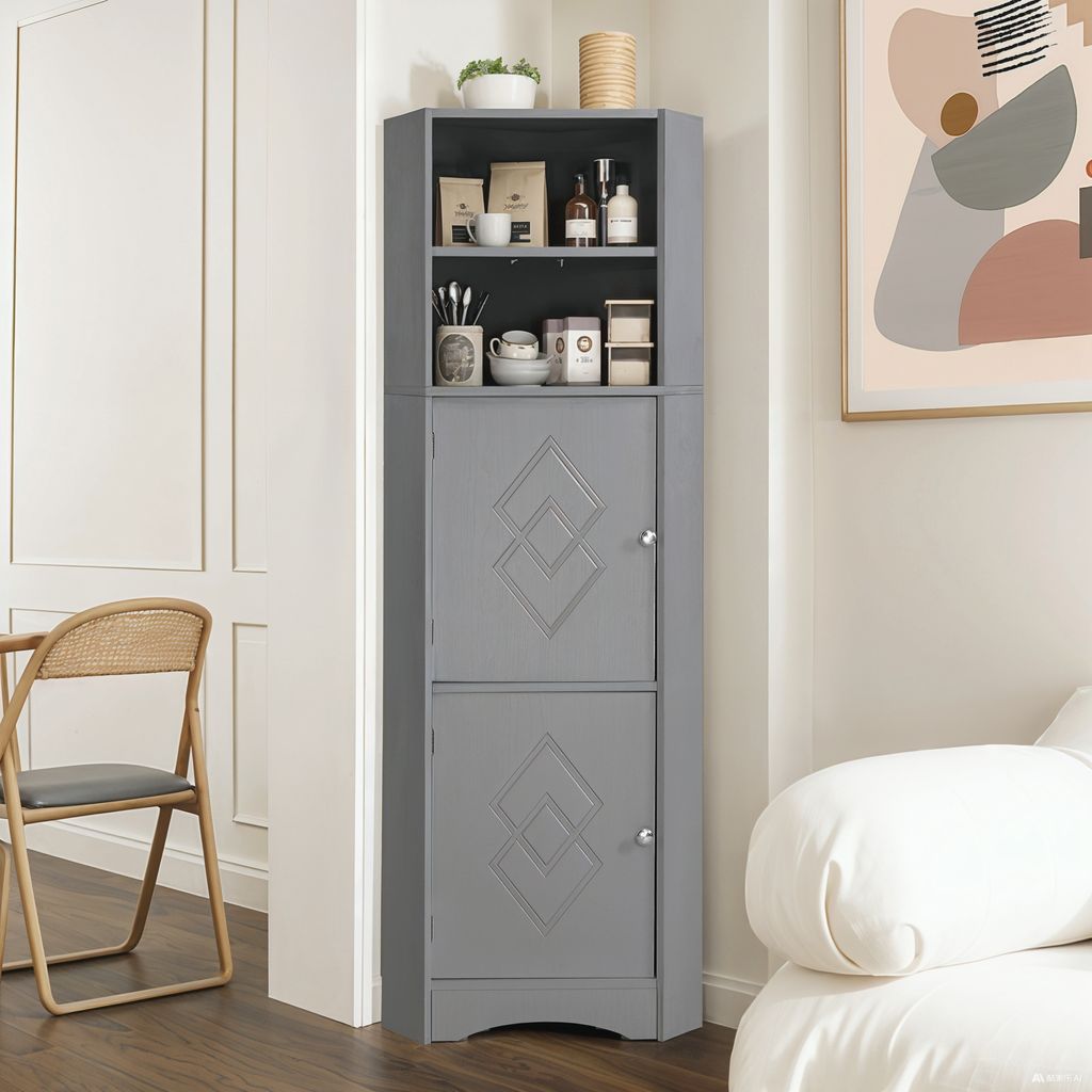 A gray corner cabinet with two open shelves and two closed cabinets, placed in a room next to a chair and a painting.