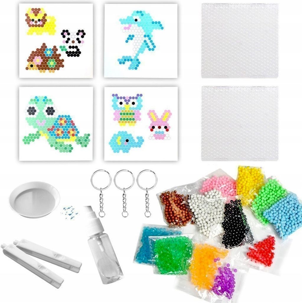 A collection of items for a water bead craft kit, including bead boards with animal designs, various colors of beads, keychain attachments, a spray bottle, and tools.