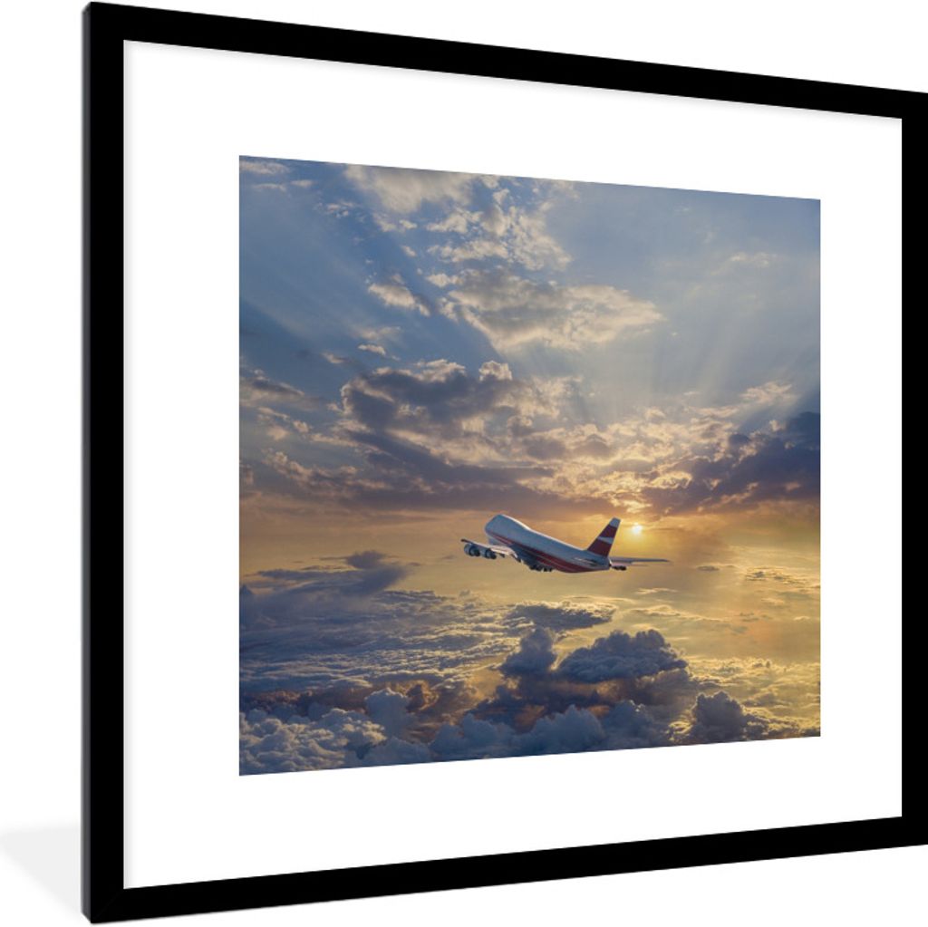 MuchoWow Gerahmtes Poster Ein Flugzeug fliegt durch den Himmel mit Sonnenstrahlen 40x40 cm - Poster mit Schwarzem Bilderrahmen Wandposter Rahmen ...