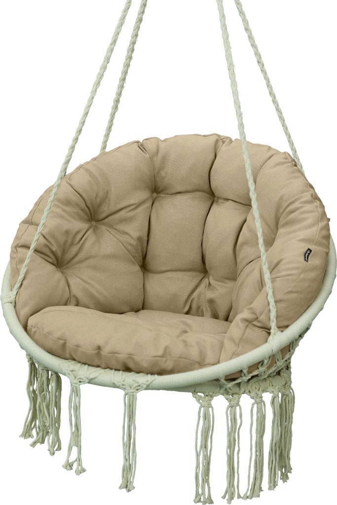 A beige hanging chair cushion with fringe detail, suspended by ropes against a white background.