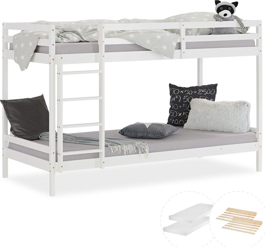 A white wooden bunk bed with mattresses and pillows.