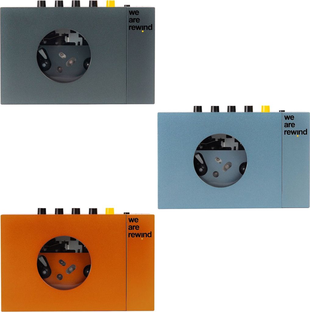 Three portable cassette players in different colors.