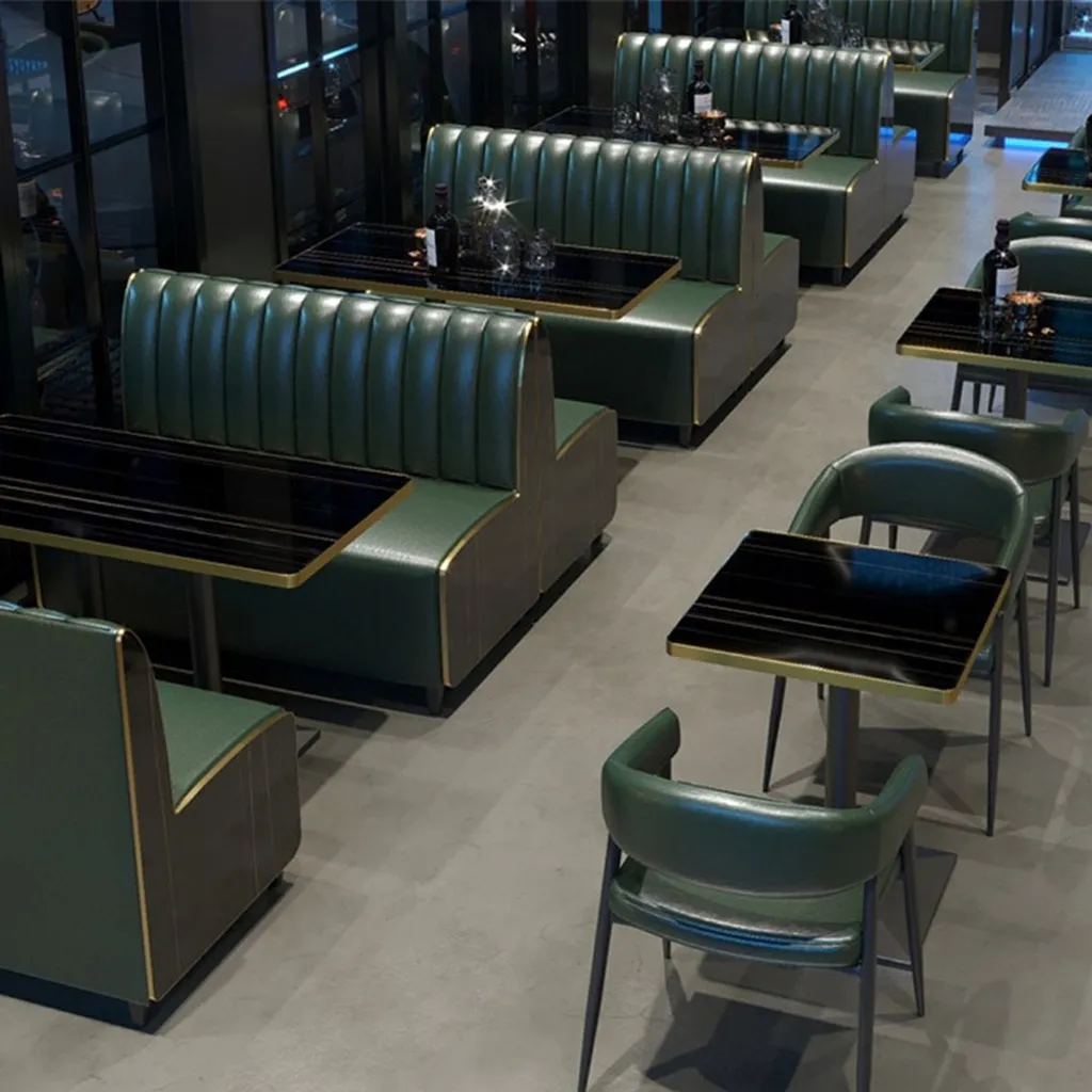 Optimisez l'espace de votre café avec ce canapé 2 places vert compact