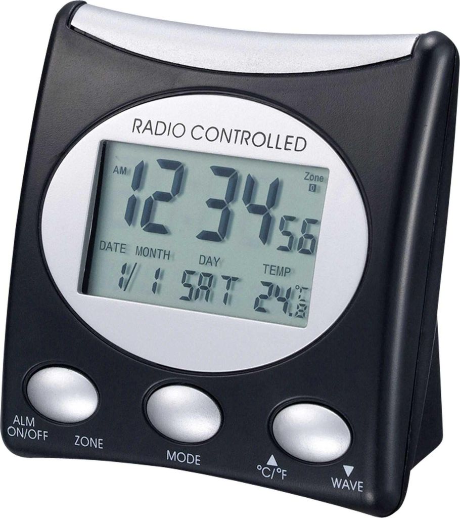 A digital alarm clock with a black plastic casing and a silver trim around the display.