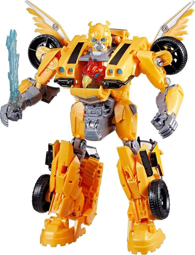 A yellow robot toy with wings and a sword is standing against a white background.