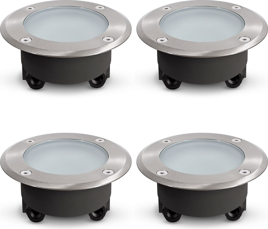 Four identical ground lights are arranged in a two-by-two grid against a white background.