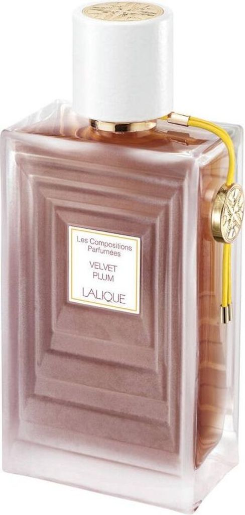 A studio shot of a Lalique perfume bottle.