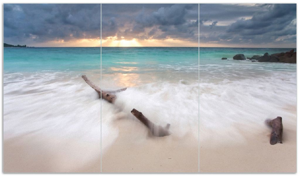 Wallario Herdabdeckplatte aus Glas, Größe 90 x 52 cm 3-teilig, Motiv Wellen am Strand bei Sonnenuntergang