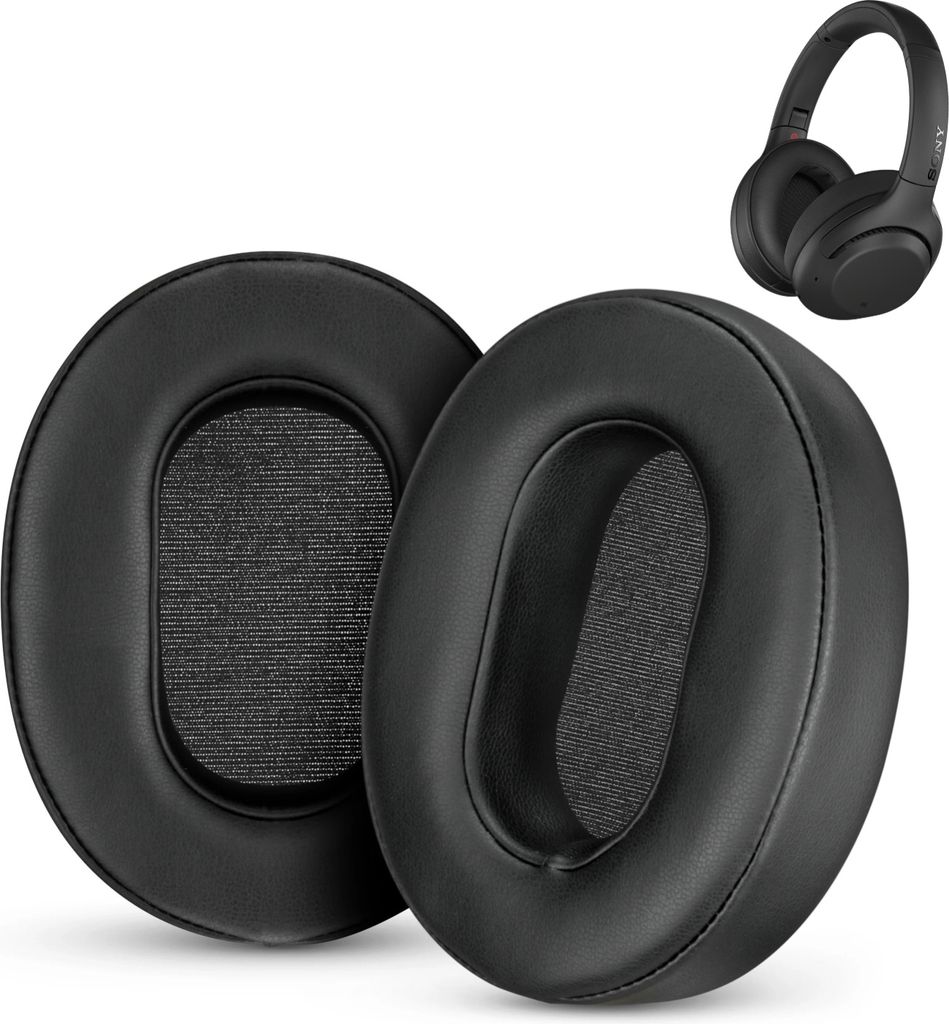 Two black ear pads for headphones are shown in the foreground, with a pair of black headphones in the background.