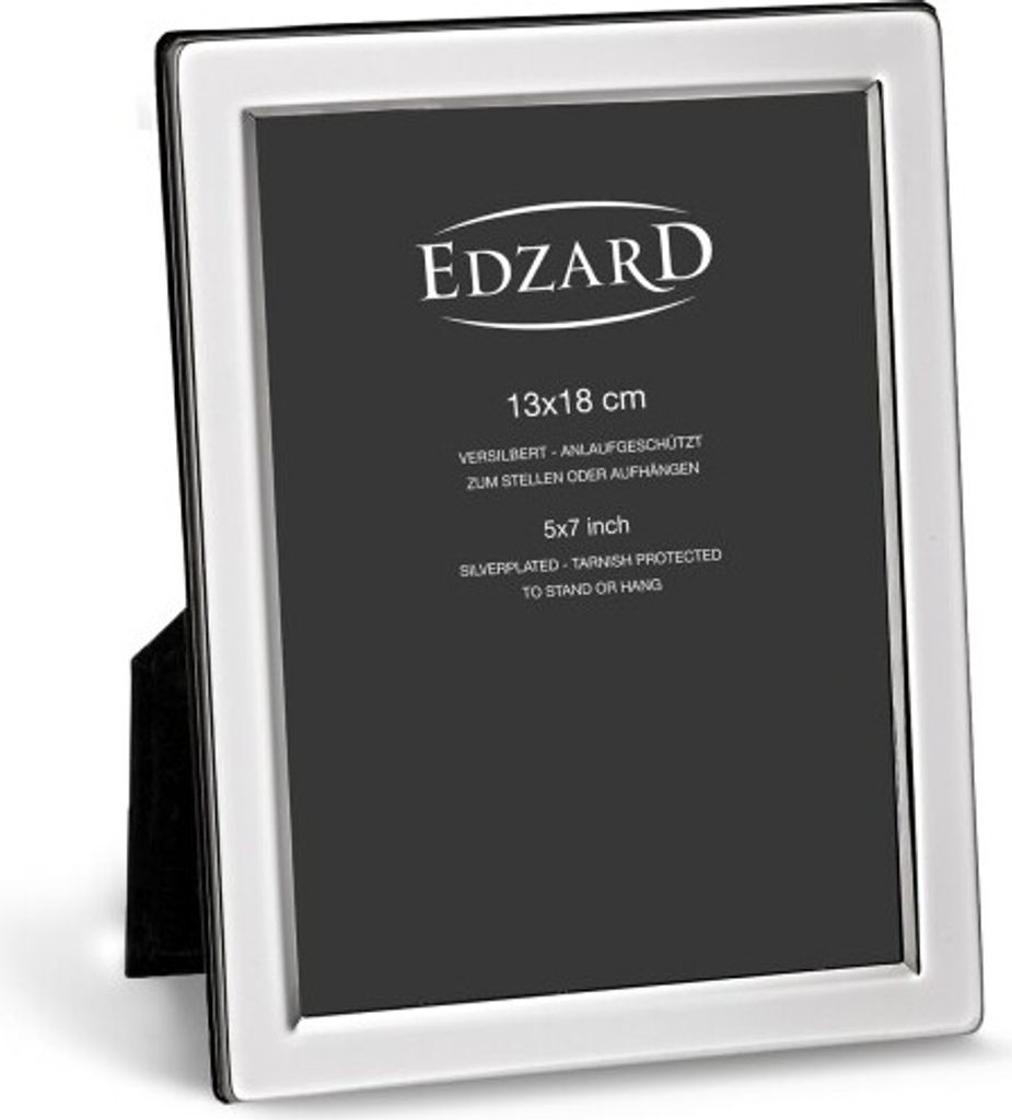 A silver picture frame with text on the black insert.