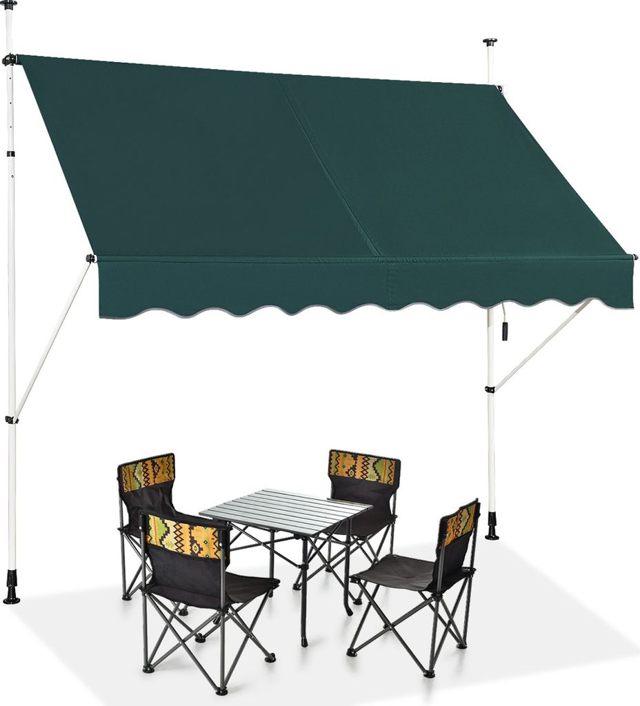 A green awning is set up over a portable table and four chairs, suggesting an outdoor recreational or camping setup.