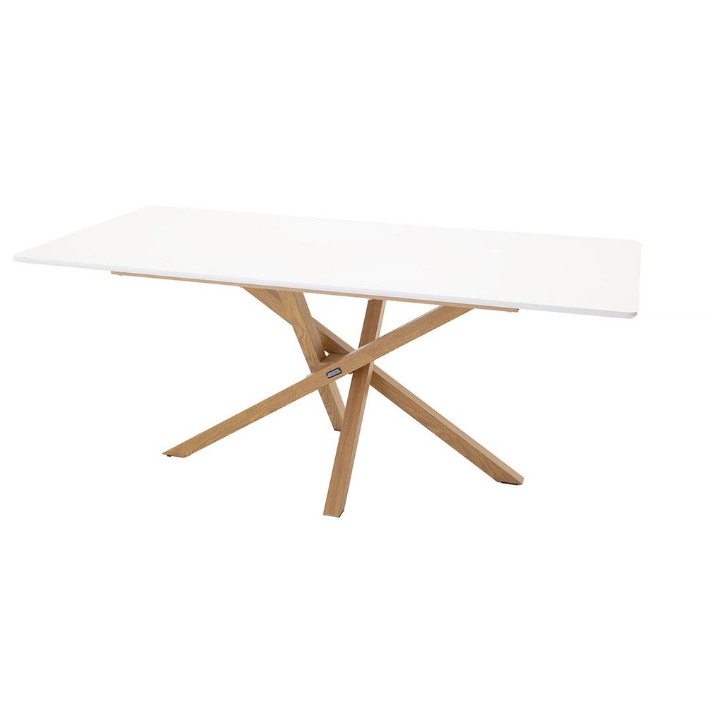 A white rectangular dining table with a wooden base.