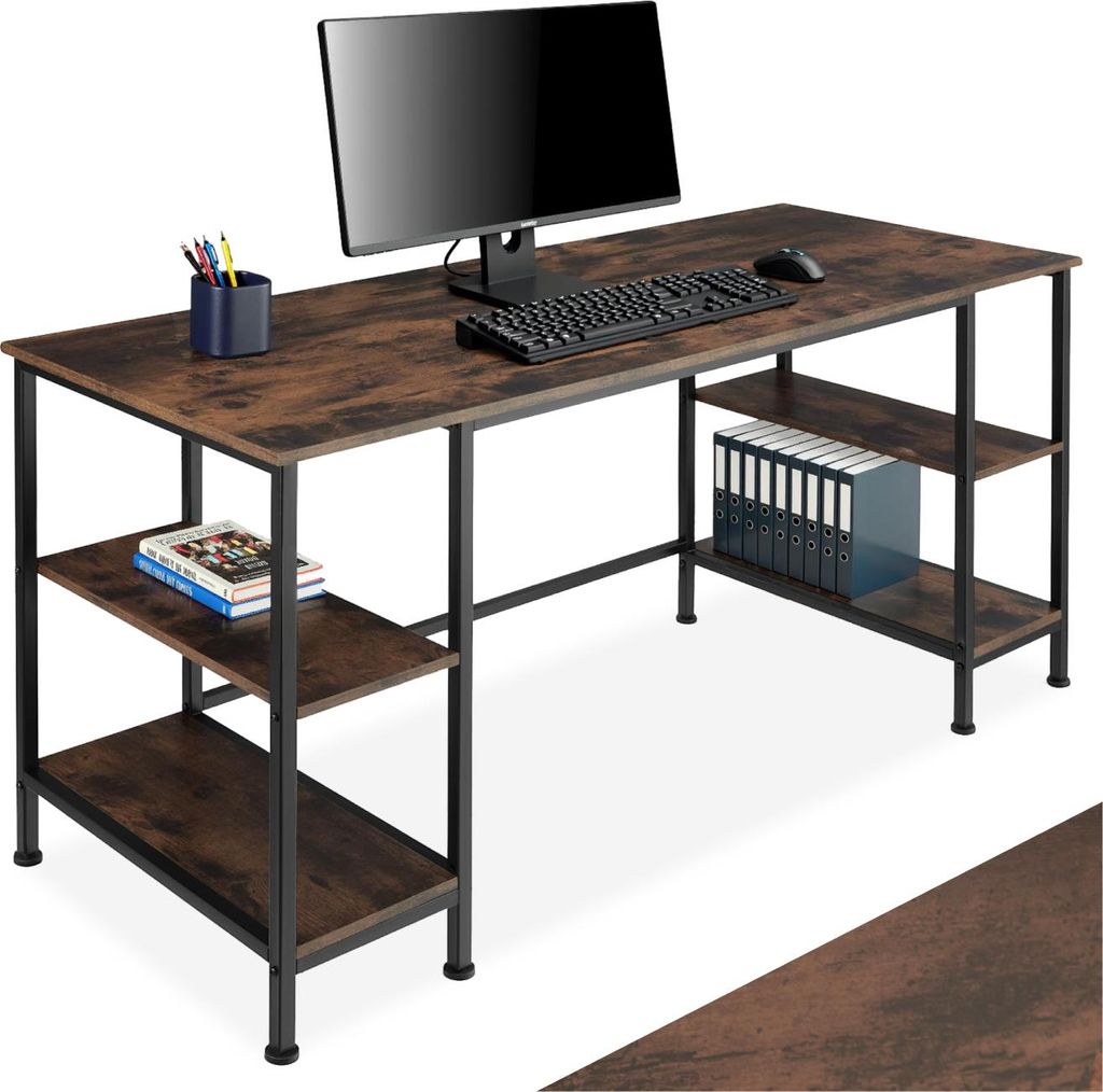 A computer desk with shelves, a monitor, keyboard, mouse, books, and binders.