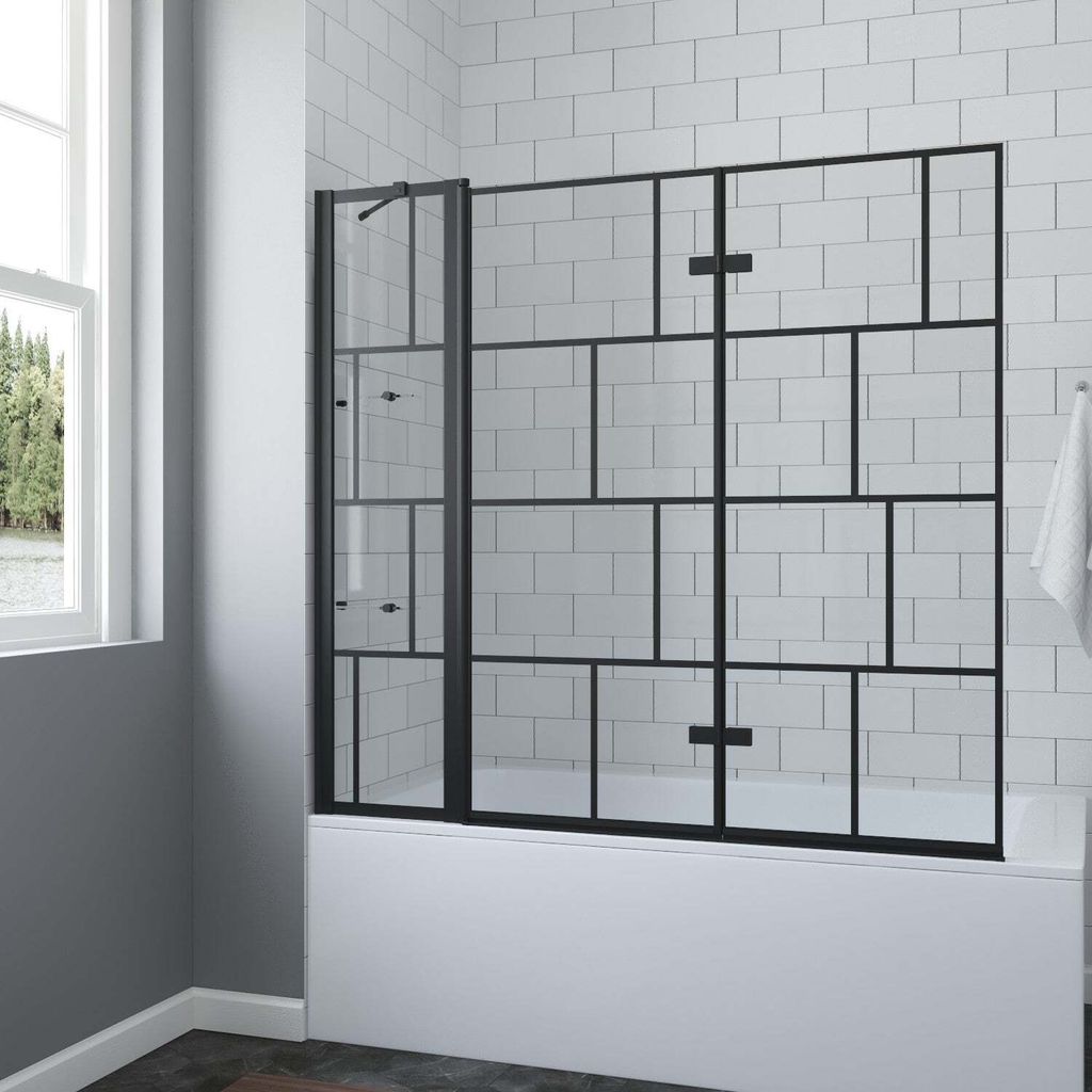 A shower screen for a bathtub in a bathroom.