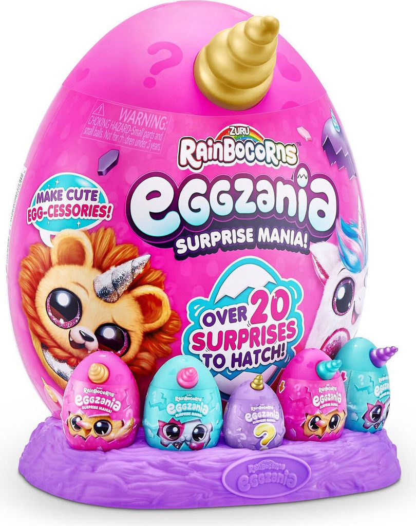 A large pink egg-shaped toy package with smaller eggs and characters displayed in front of it, all on a purple base.