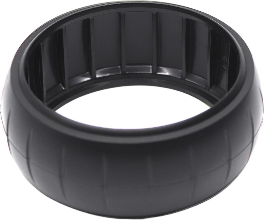 A black plastic ring with a ribbed outer surface and a grooved inner surface, presented on a white background.